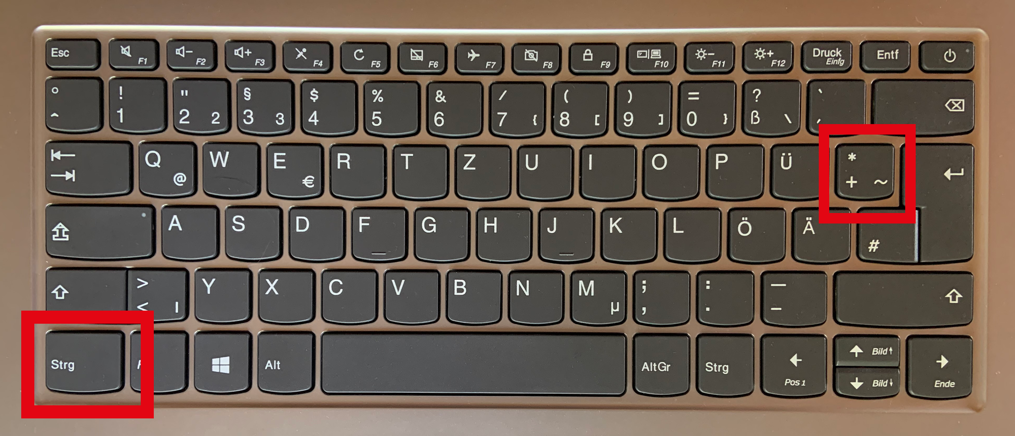 Schrift vergrößern. Bild Computertastatur auf der die Tasten Strg und Plus markiert sind.